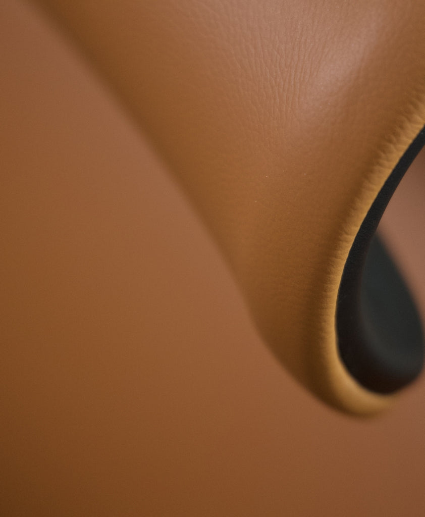 http://www.xchair.com/cdn/shop/products/PDP_X4_HighlightImage-Cognac_Leather_Closeup_1024x1024.jpg?v=1682286327